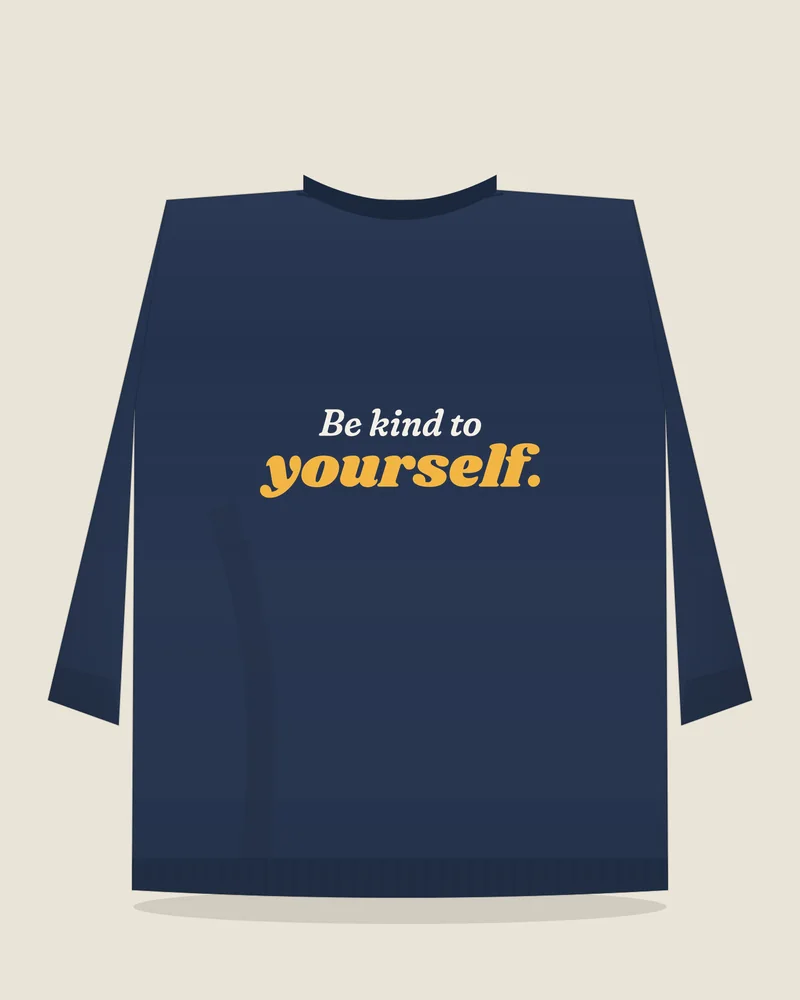 Navy crewneck sweatshirt with the print “Be kind to yourself.”, back view (illustration)