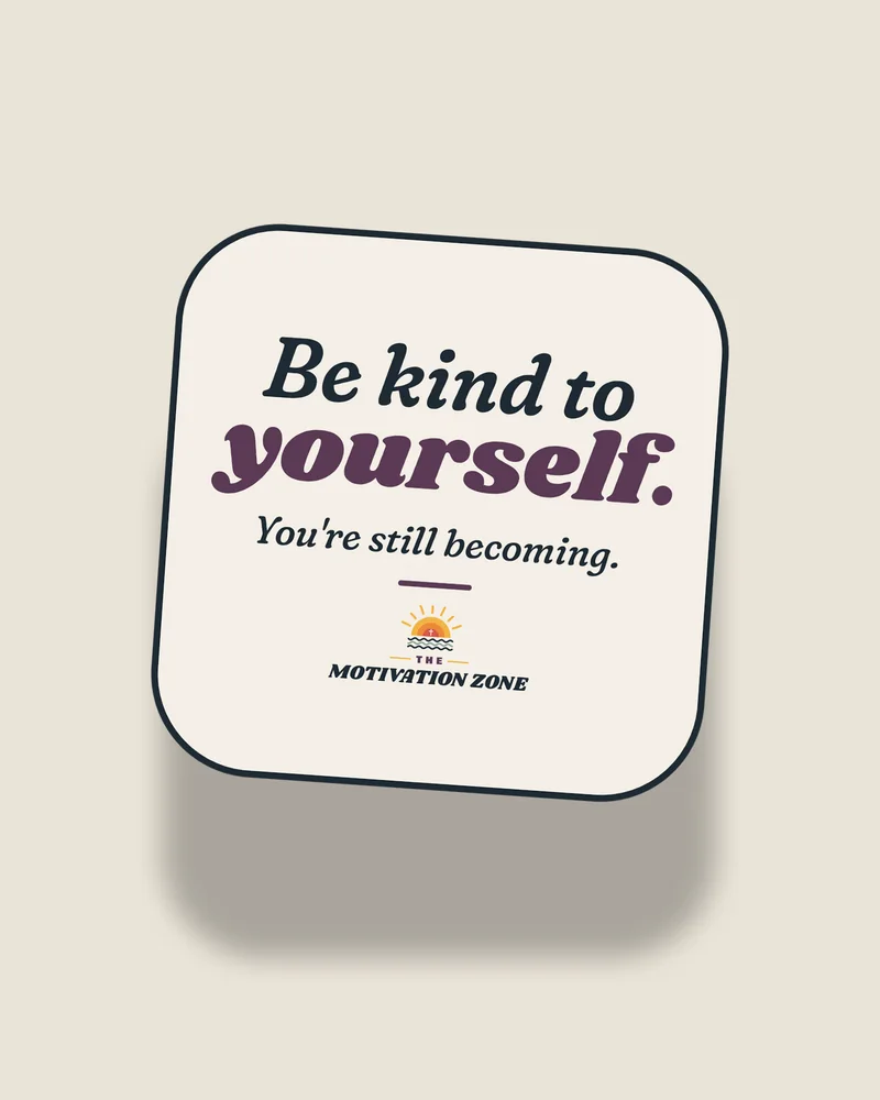 White sticker with the print “Be kind to yourself.”, front view (illustration)