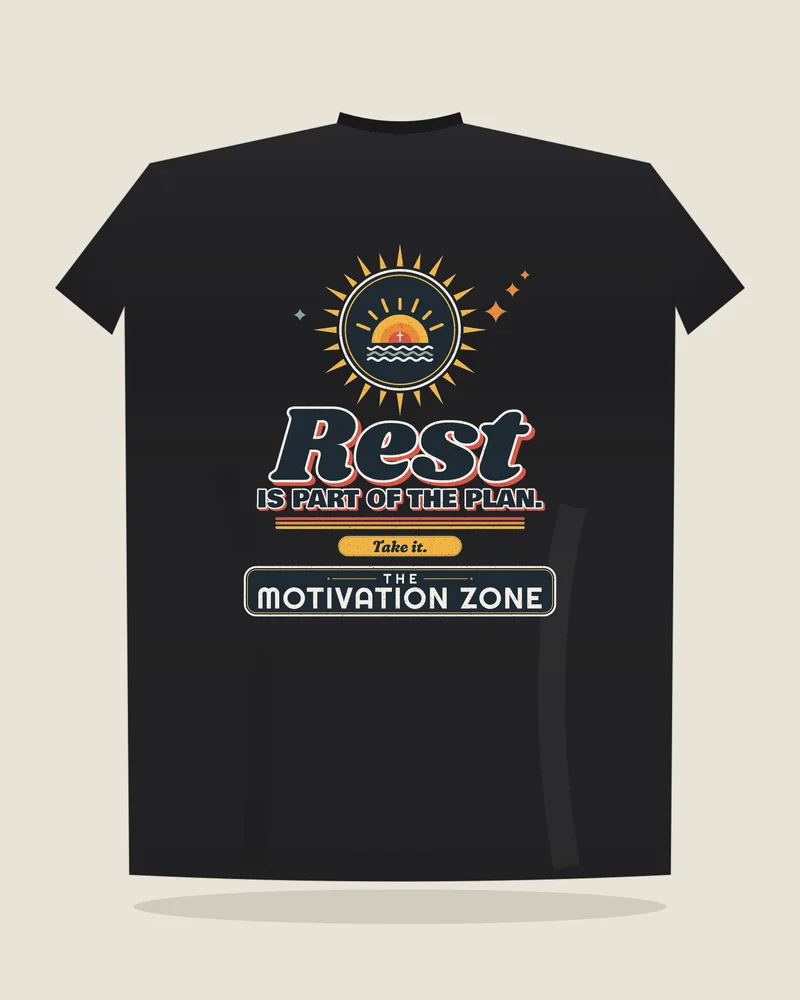 Black tee with the print “Rest is part of the plan.”, back view (illustration)