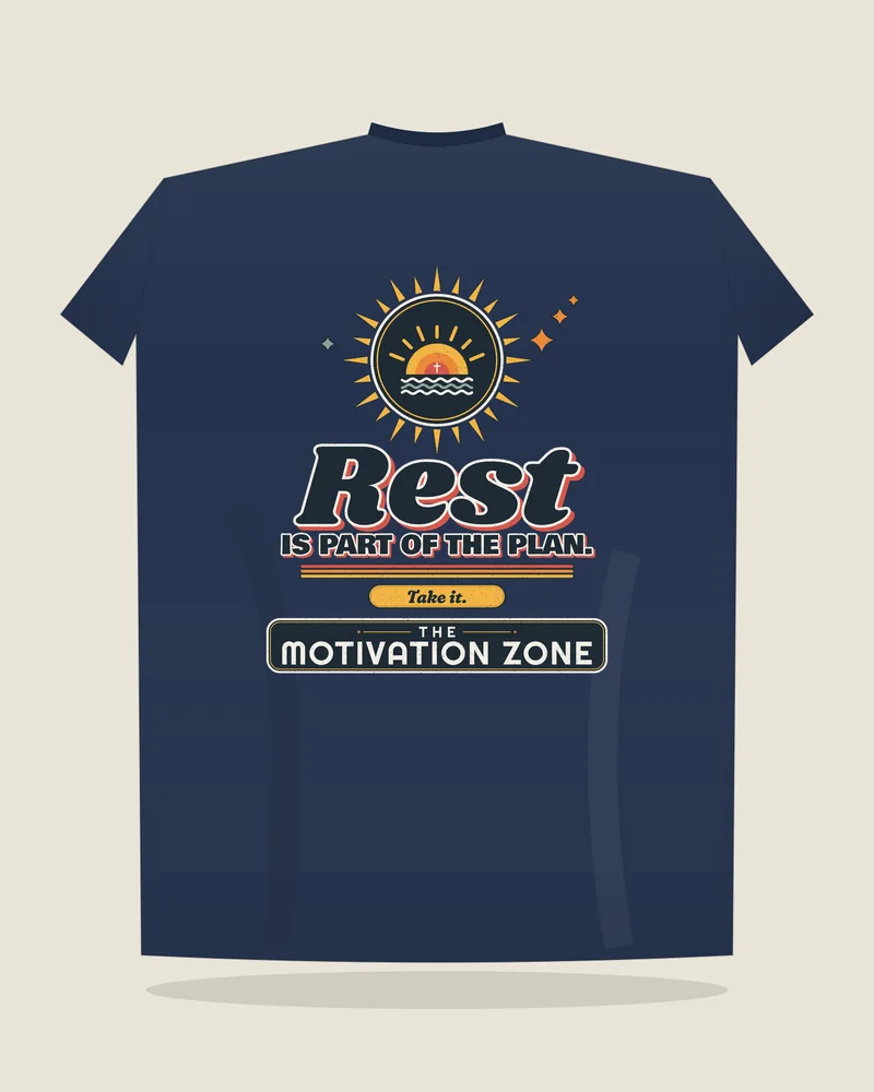 Navy tee with the print “Rest is part of the plan.”, back view (illustration)