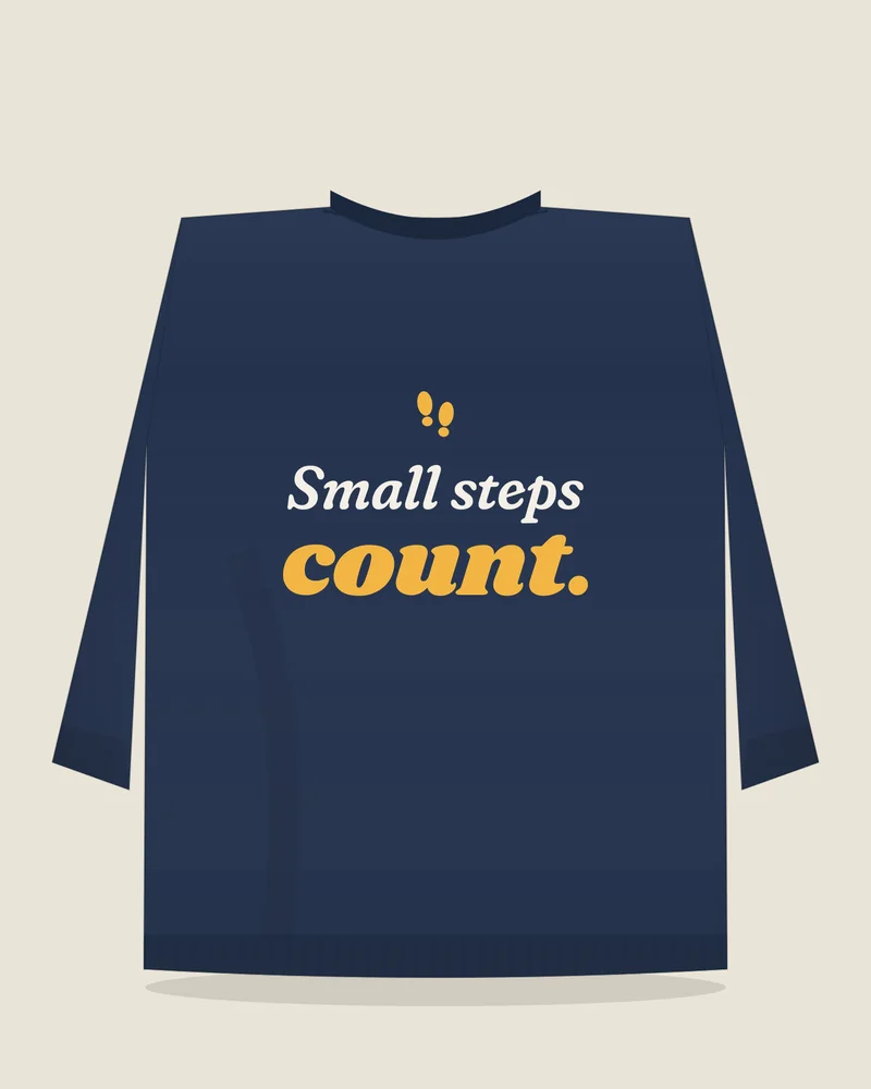 Navy crewneck sweatshirt with the print “Small steps count.”, back view (illustration)