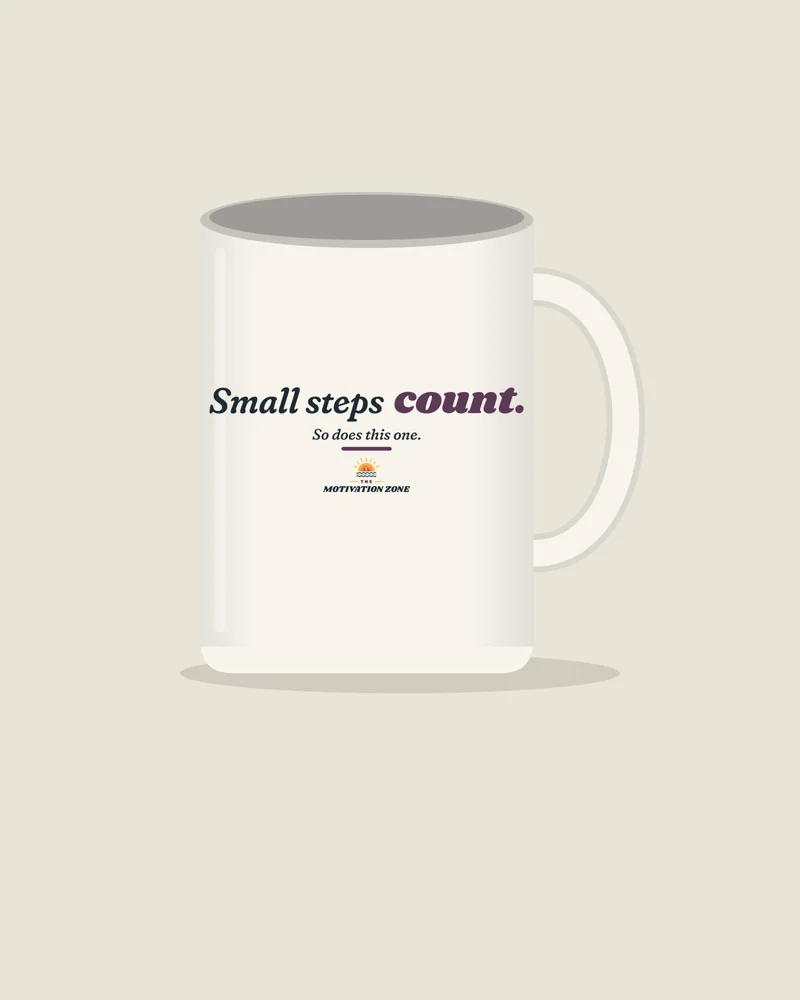 White mug with the print “Small steps count.”, view (illustration)